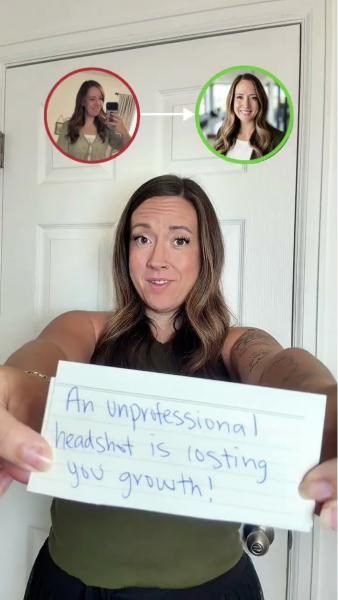 Creator holding a handwritten sign