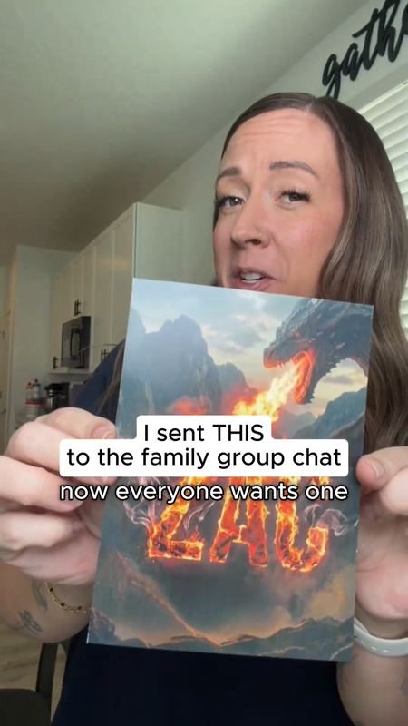 Creator holding a dragon card